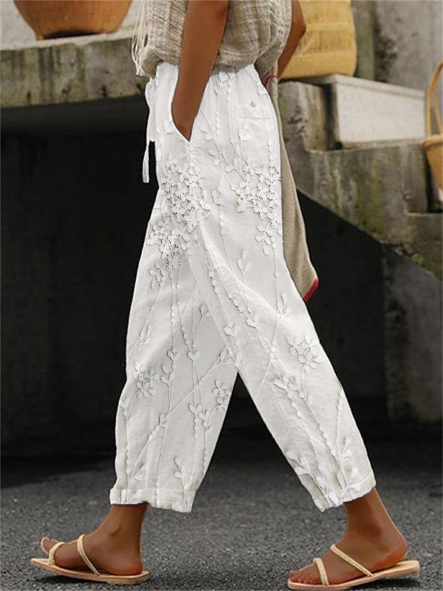 Elegante, mit Blumen bestickte Leinen hosen für Damen